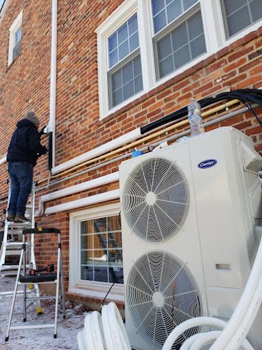 Technician on ladder